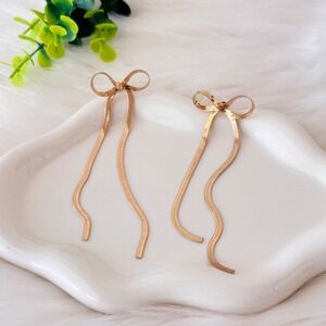Elegant Gold Bow Herringbone Dangle Earrings